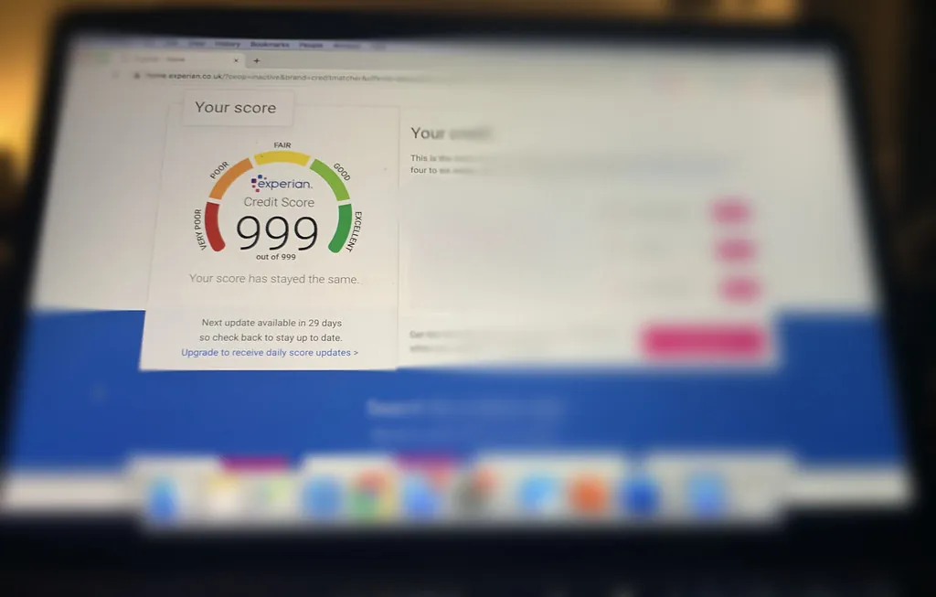 credit score report on laptop screen