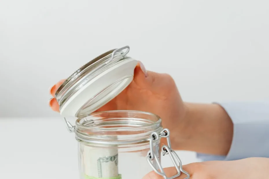 jar of money savings on desk