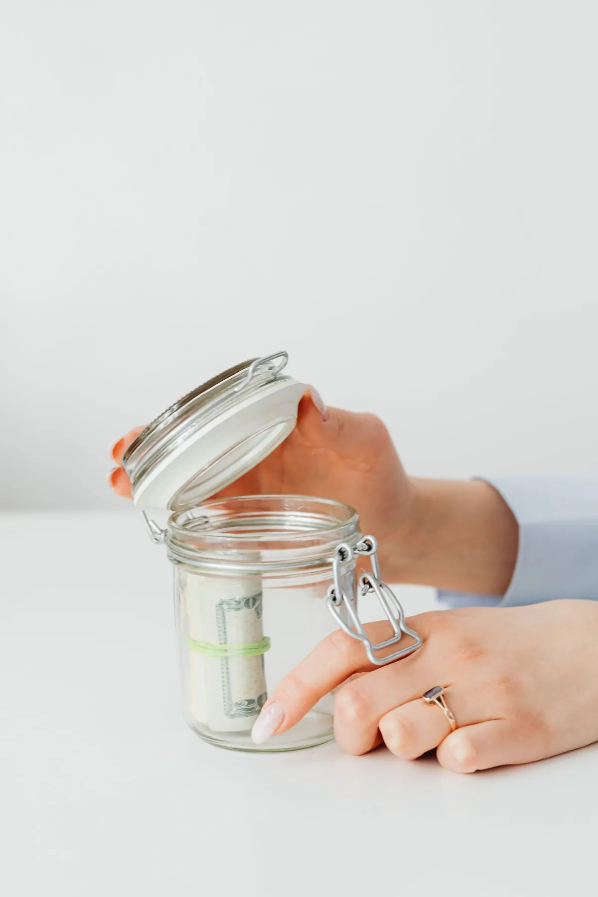 jar of money savings on desk