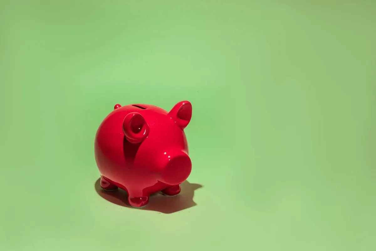 piggy bank with calculator retirement plan