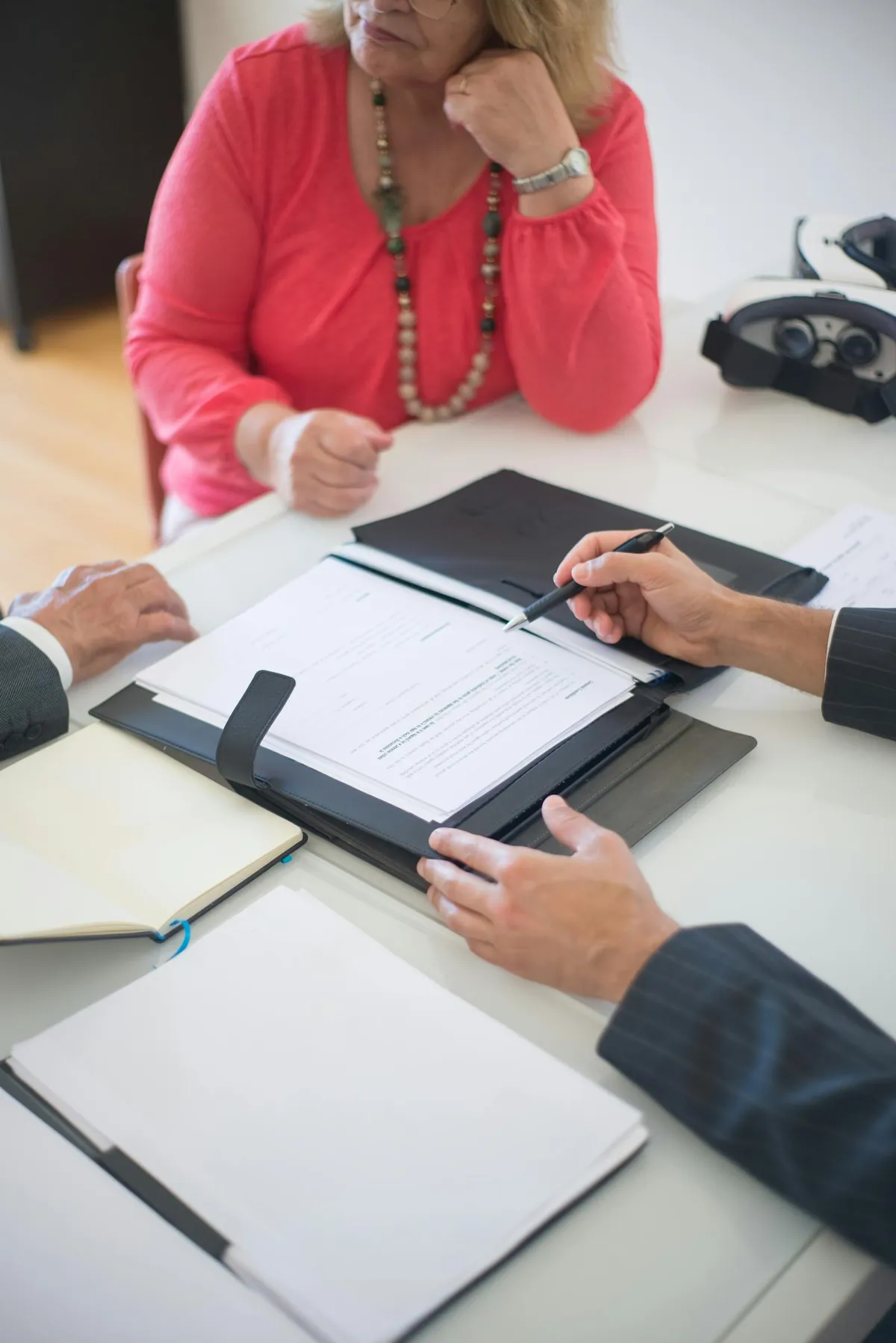 retirement contract handshake older couple