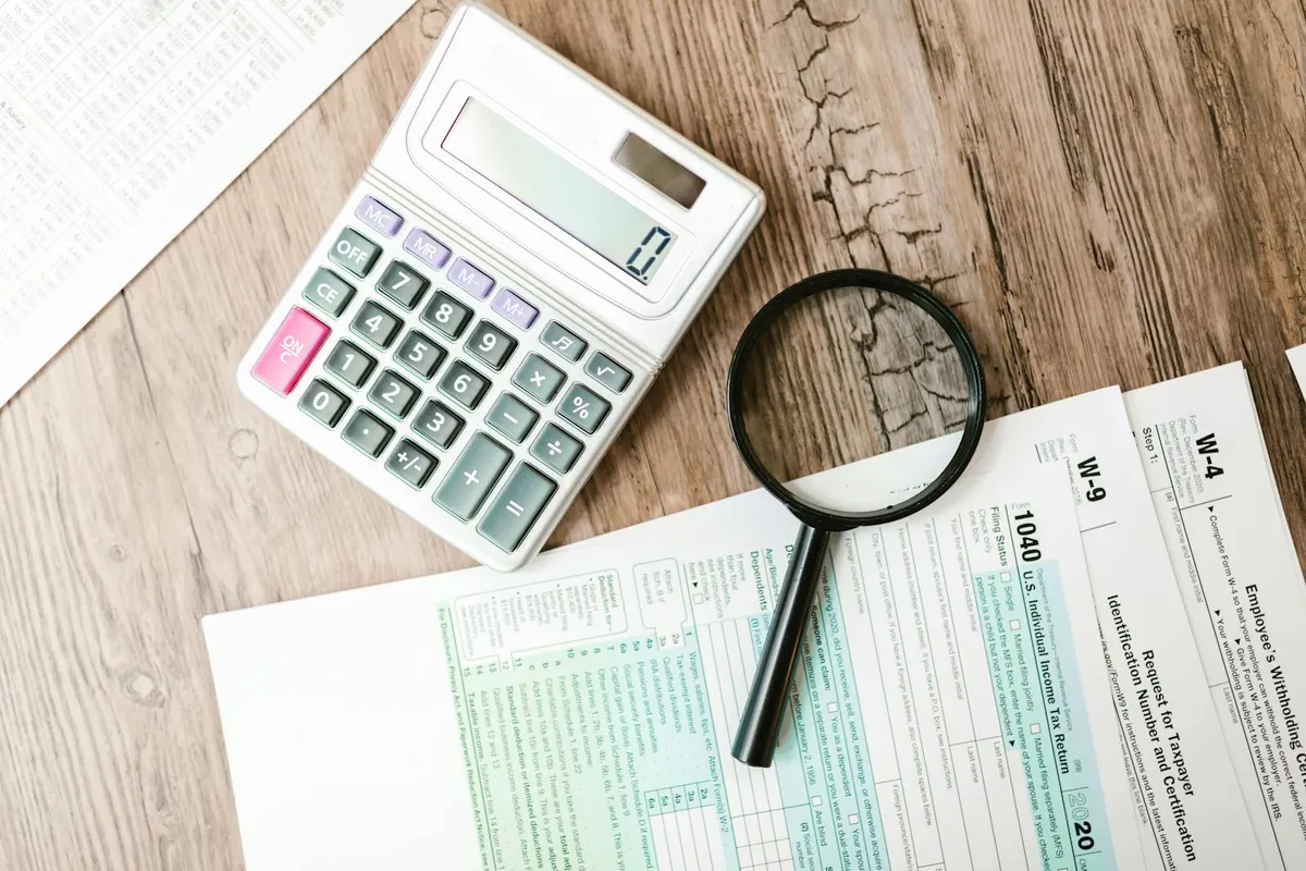tax forms 1040 calculator desk