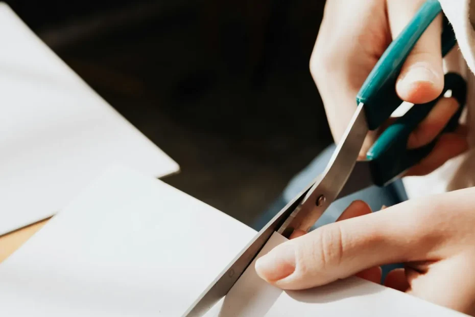 scissors cutting expense bill paper savings